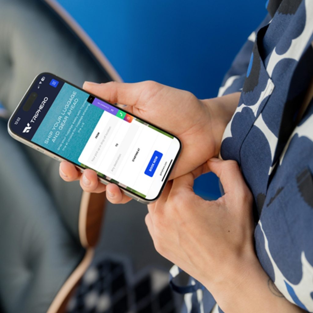 GoTripHero mobile app on phone for golf club shipping